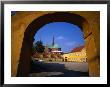 Roskilde Cathedral Framed In Archway From The Palace Garden, Roskilde, Denmark by Anders Blomqvist Limited Edition Print