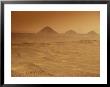 Two Men Cross The Barren Desert At Giza by Kenneth Garrett Limited Edition Print