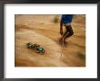 Child Pulling His Toy Truck At High Speed by Michael Nichols Limited Edition Print