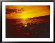 Sunset Over The Ocean As Seen From A Maui Beach by Todd Gipstein Limited Edition Print