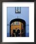View Of Busy Street Through An Archway In Stare Miasto, Warsaw, Poland by Izzet Keribar Limited Edition Print