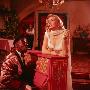 Actor Clarence Muse At Piano With Actress Anita Ekberg In Scene From Tv Version Of Casablanca by Loomis Dean Limited Edition Print