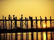 People Walking Across The Ubein Bridge At Sunset In Mandalay, Burma by Scott Stulberg Limited Edition Print