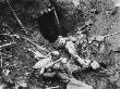 Dead German Soldier Outside A Dugout During World War I On The Western Front by Robert Hunt Limited Edition Pricing Art Print