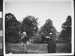 Young Zelma Levison And Her Aunt, Jo Grimwood Throwing A Ball In Prospect Park, Brooklyn, Ny by Wallace G. Levison Limited Edition Print