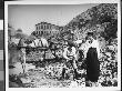 A Young Boy And Girl Investigating Hoxie's Quarry With Workmen In Background by Wallace G. Levison Limited Edition Pricing Art Print