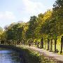 Group Of People Walking On The Road At A Riverside by Per-Erik Adamsson Limited Edition Print