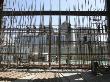 Construction Workers Build A Curtain Wall At The Cyts Project In Donghzimen In Beijing By Gmp by Ben Mcmillan Limited Edition Print