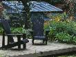 Decking Beside Lily Pool With Adirondack Chairs, Designer: Duncan Heather by Clive Nichols Limited Edition Print