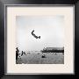 Man Flying Off A Trampoline At Santa Monica Beach by Loomis Dean Limited Edition Print