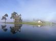 Porzhensky Pogost Graveyard & C17th St. George Church In Glazovo Village In Mist, Russia by Igor Shpilenok Limited Edition Pricing Art Print