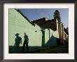 A Man Makes His Way Down Boca Street At The Historic Center Of Trinidad by Javier Galeano Limited Edition Print