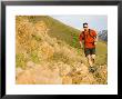 Man Taking A Sip Of Water Whilst Trail Running On The Mount Olympus Trail, Wasatch Mountains, Usa by Mike Tittel Limited Edition Pricing Art Print