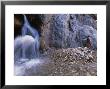 River Guide Escapes The Heat Next To A Waterfall by Bill Hatcher Limited Edition Print