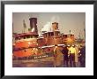 Men At Pier Looking At 3 Tugboats, One Named Courageous With Crewmen On Deck by Andreas Feininger Limited Edition Print