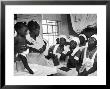 Nurse/Midwife Maude Callen Holds Baby And Teaches Class In Midwifery How To Look For Abnormalities by W. Eugene Smith Limited Edition Print