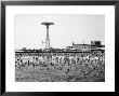 Bathers Enjoying Coney Island Beaches. Parachute Ride And Steeplechase Park Visible In The Rear by Margaret Bourke-White Limited Edition Pricing Art Print