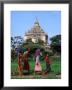 Villagers Walking On Path Near Thatbyinnyu Old Bagan, Mandalay, Myanmar (Burma) by Glenn Beanland Limited Edition Print