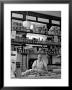 Butcher Standing At Meat Counter Of Deli by Alfred Eisenstaedt Limited Edition Print