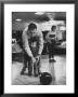 Dad Showing 3 Year Old Daughter The Basics Of Bowling by George Silk Limited Edition Pricing Art Print