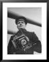 Navy Soldier Holding Camera by George Strock Limited Edition Pricing Art Print