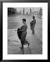 Monks Begging For Food At Dawn On Main Thoroughfare Of Bangkok by Howard Sochurek Limited Edition Print