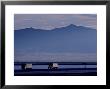 Trucks Along The Highway Next To Great Salt Lake, Utah by Kenneth Garrett Limited Edition Print