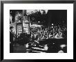 Crowd Watching From Bleacher Seats Set Up On The Right Side Of Entrance To The Rko Pantages Theatre by Ed Clark Limited Edition Print