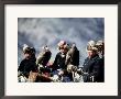 Eagle Hunters At The Golden Eagle Festival, Mongolia by Amos Nachoum Limited Edition Print