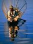 Man In Traditional Boat On Lake, Inle Lake, Myanmar (Burma) by Juliet Coombe Limited Edition Print