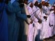 Men Performing Dance, With Sticks, Abu Dhabi, United Arab Emirates by Chris Mellor Limited Edition Print