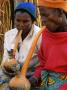 Tonga Women From Batonka Tribe Smoking Pipes, Zimbabwe by Roger De La Harpe Limited Edition Print