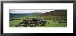 Rock Formations On A Landscape, Grimspound, Manaton, Dartmoor, Devon, England by Panoramic Images Limited Edition Print