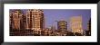 Buildings Lit Up At Night, New City Center, Alameda County, Oakland, California, Usa by Panoramic Images Limited Edition Pricing Art Print