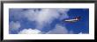 Passenger Jet, Flying, Clouds by Panoramic Images Limited Edition Print