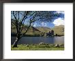 Loch Awe And The Ruins Of Kilchurn Castle, Strathclyde, Scotland, United Kingdom by Adam Woolfitt Limited Edition Print