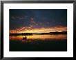 A Canoe At Sunset In East Manitoba by Bill Curtsinger Limited Edition Print