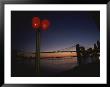 A Sunset View Of The Brooklyn Bridge And A Nearby Stoplight by Roy Gumpel Limited Edition Print