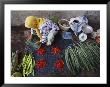 A Woman Sells Vegetables At An Open-Air Market In Malaysia by Steve Raymer Limited Edition Print
