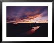 A Gorgeous Purple And Gold Sunset Tints Windswept Clouds And The Sweetwater River by Lowell Georgia Limited Edition Print
