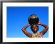 Zulu Woman Carrying Beer Pot, Zululand, South Africa by Ariadne Van Zandbergen Limited Edition Print