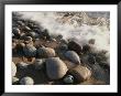 A Close View Time Exposure Of Surf Washing Over Stones On The Beach by Michael S. Lewis Limited Edition Print