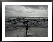 Child Standing At The Edge Of Tide by Krzysztof Rost Limited Edition Print