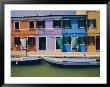 A View Of The Brightly Colored Buildings Of Burano With Gondolas Floating At Their Doorsteps by Richard Nowitz Limited Edition Print