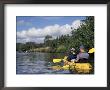 Couple Kayaking The Hule'ia River, Kauai, Hawaii, Usa by John & Lisa Merrill Limited Edition Print