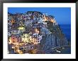 Dusk Falls On A Hillside Town Overlooking The Mediterranean Sea, Manarola, Cinque Terre, Italy by Dennis Flaherty Limited Edition Pricing Art Print