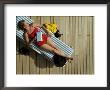 Woman Sleeping On The Deck Of A Cruise Ship by Todd Gipstein Limited Edition Pricing Art Print