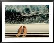 Woman's Feet Standing On The Railing Of A Cruise Ship With Sea Below by Todd Gipstein Limited Edition Print