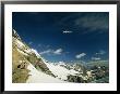 Person Dangles From A Helicopter At Abbot Pass In Yoho National Park by Michael Melford Limited Edition Print