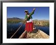 Portrait Of A Uros Indian Woman On A Traditional Reed Boat, Lake Titicaca, Peru by Gavin Hellier Limited Edition Pricing Art Print